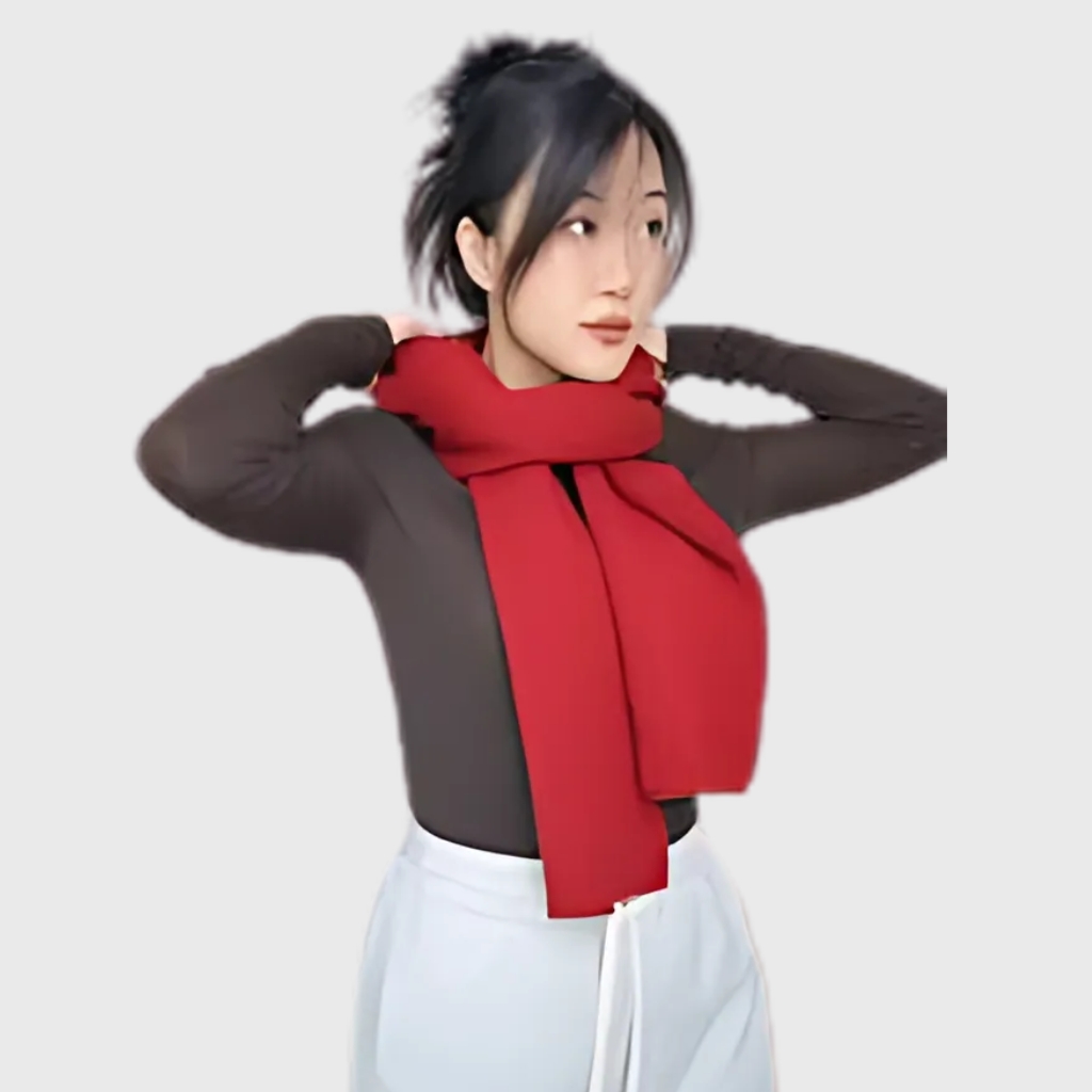 Person places a scarf over their head, covering the top and sides of the head in preparation to tie it like a balaclava.