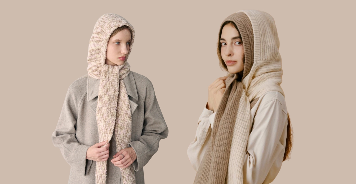 Person wearing a scarf styled as a balaclava, covering the head and neck for winter warmth