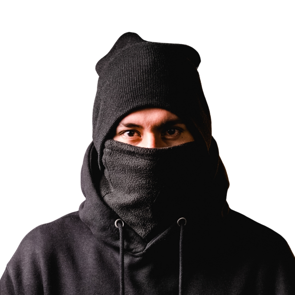 A person wearing a black balaclava and hoodie, with only their eyes visible.
