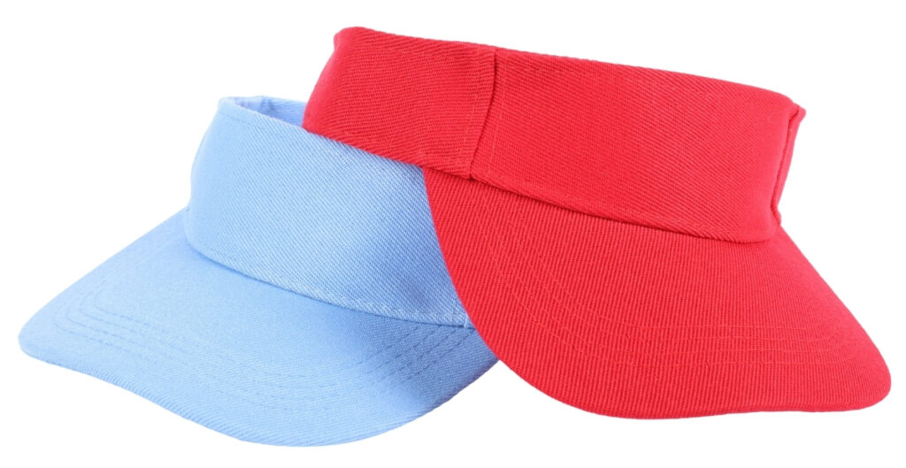 "A red visor and a light blue visor layered together, showcasing premium visor caps with wide brims and knit fabric."