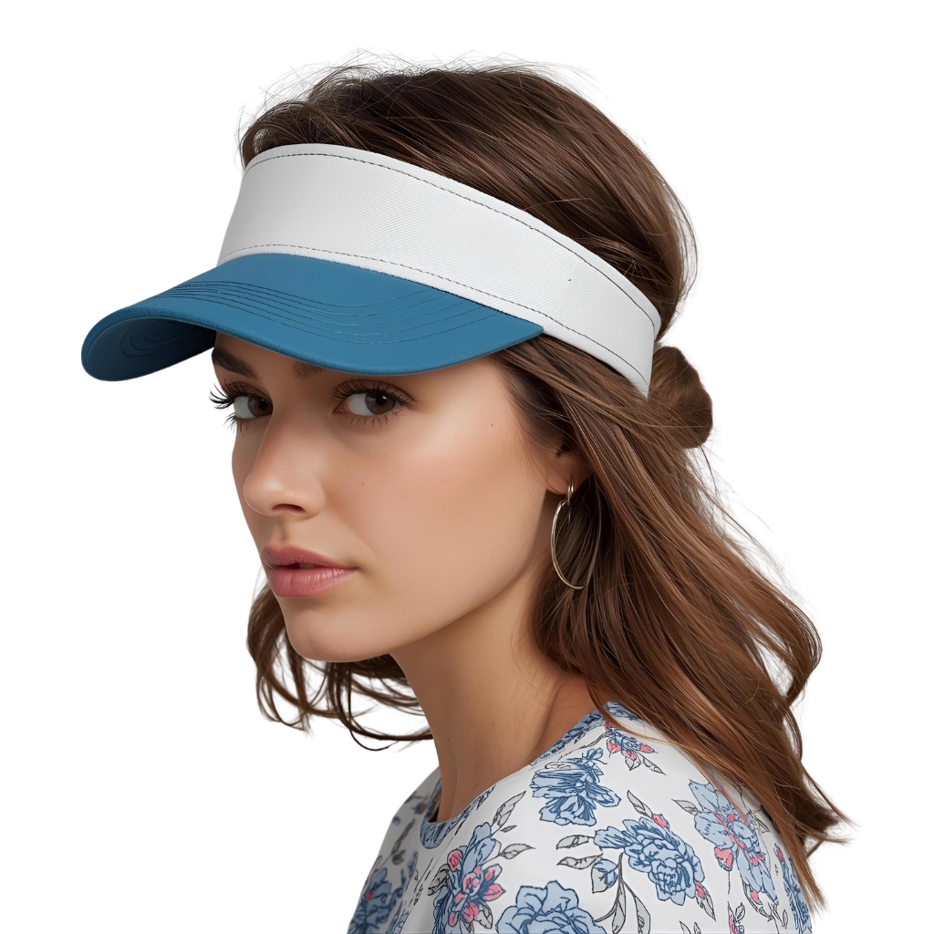 A woman wearing a two-tone white and blue visor, with long brown hair, wearing a floral shirt and large hoop earrings