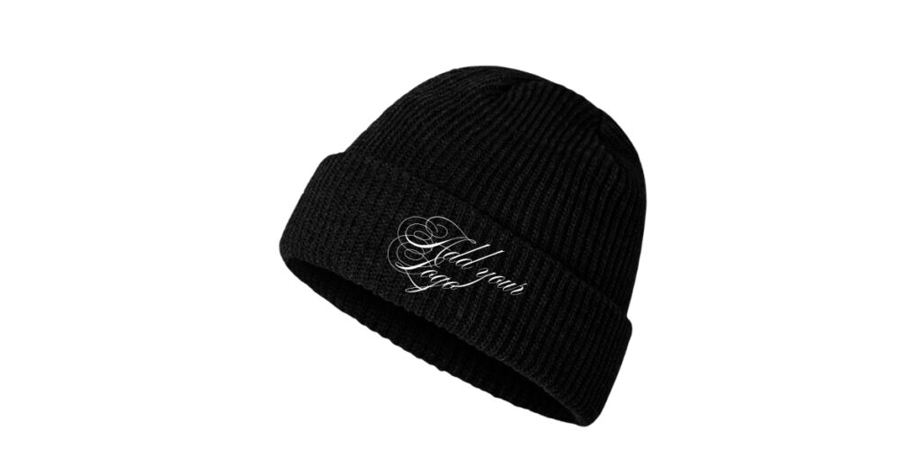 Black knit beanie with a folded cuff featuring a white cursive logo embroidered on the front