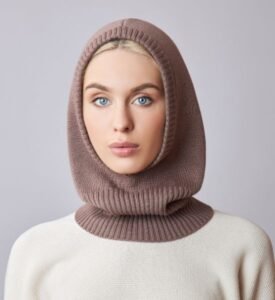 Woman wearing a soft brown balaclava hat with a ribbed neck design.