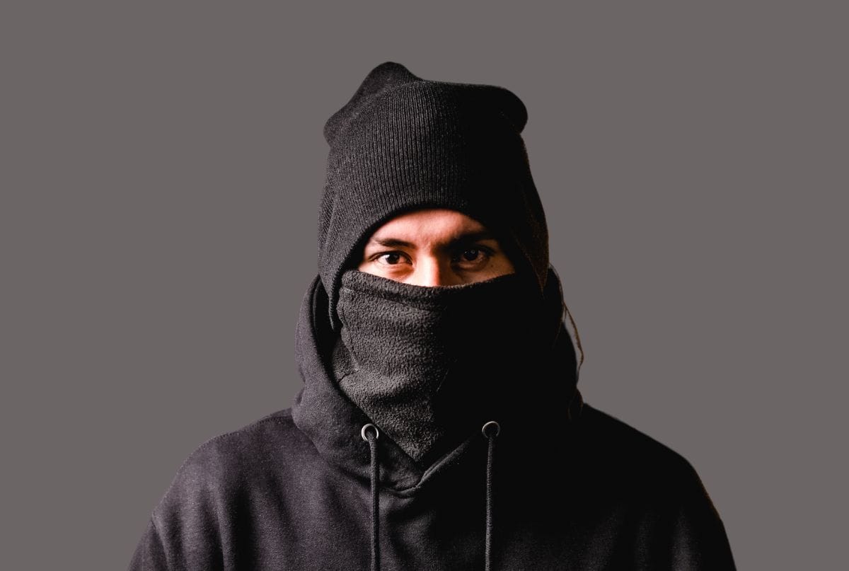 A high-quality mesh balaclava displayed on a mannequin, showcasing breathable fabric and sleek design.