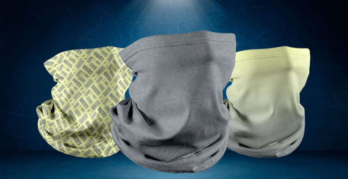"Manufacturing facility producing assorted neck gaiters in various colors and patterns."