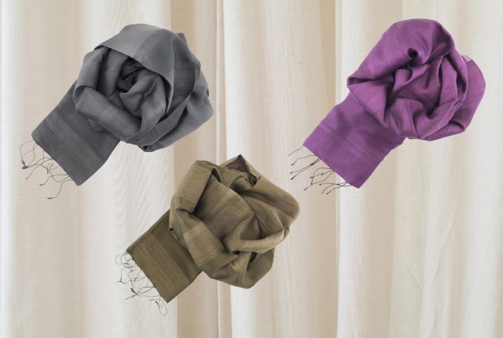 A luxurious, stylish evening scarf made from sustainable materials, showcasing vibrant colors and elegant designs.