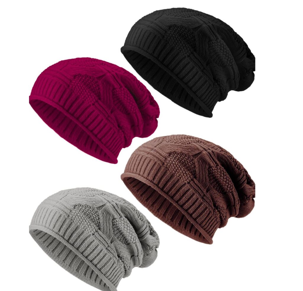 “Collection of four knit slouchy beanies in black, magenta, brown, and light gray, shown from a side angle to highlight their ribbed cuffs and textured knits.”