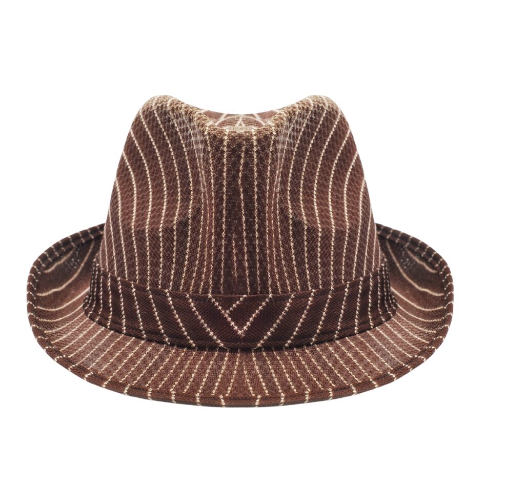 A brown fedora-style hat with white striped stitching in a geometric pattern, featuring a darker band around the base of the crown.
