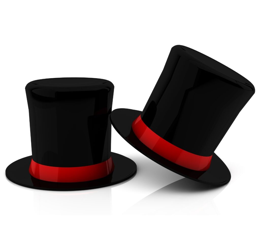 Two black top hats with red bands, one standing upright and the other tilted, set against a white background.