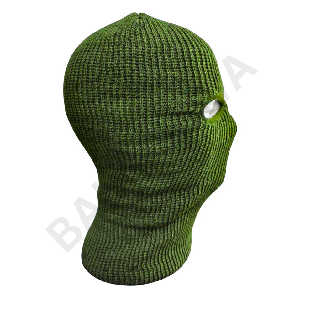 Green knitted balaclava covering the head and neck with eye opening.