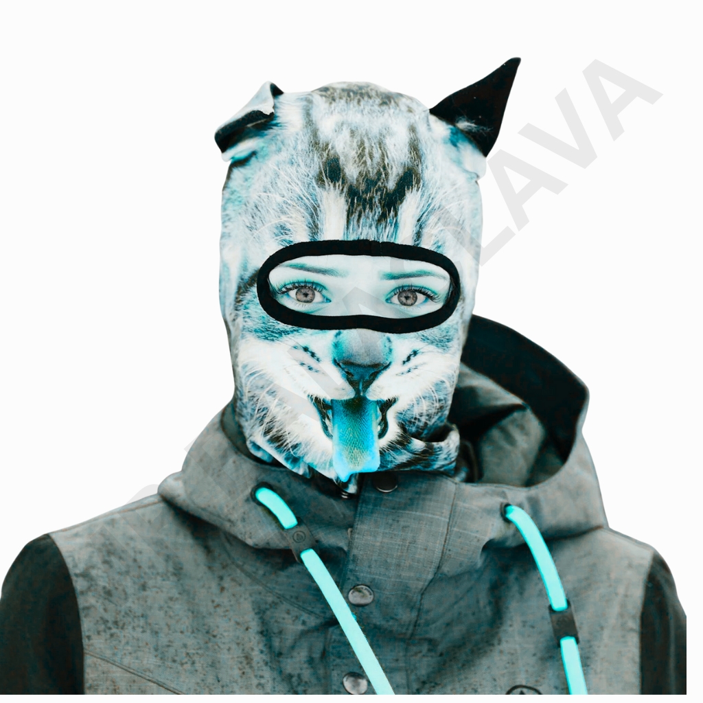 Person wearing a feline-print balaclava with eye opening over a hooded jacket, turquoise drawstrings.