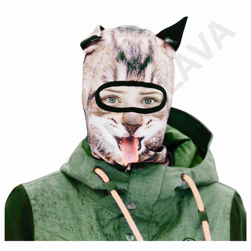 Person wearing a cat-face balaclava with eye opening, paired with a green hooded jacket.