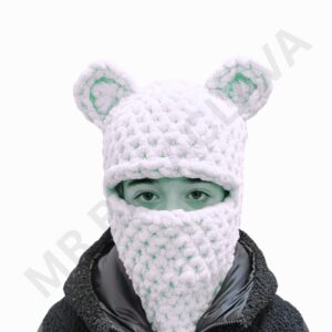 White crochet balaclava with knit texture and two rounded ear-like protrusions, worn over the head with eye and neck openings.