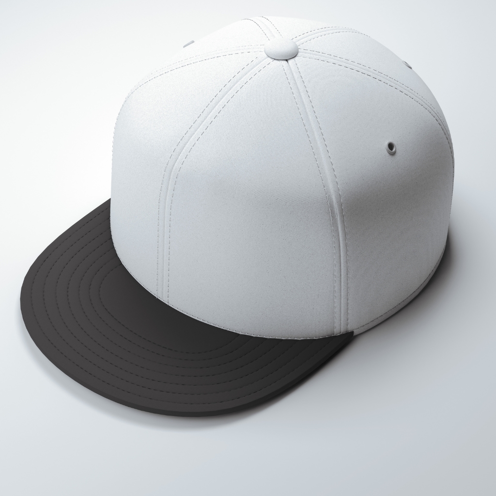 A white custom snapback cap with a dark brim, seen from a slightly angled top-left perspective. The cap features visible stitching panels and a small ventilation eyelet on the side.
