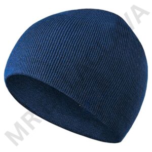 A blue knitted beanie hat with a folded ribbed cuff.