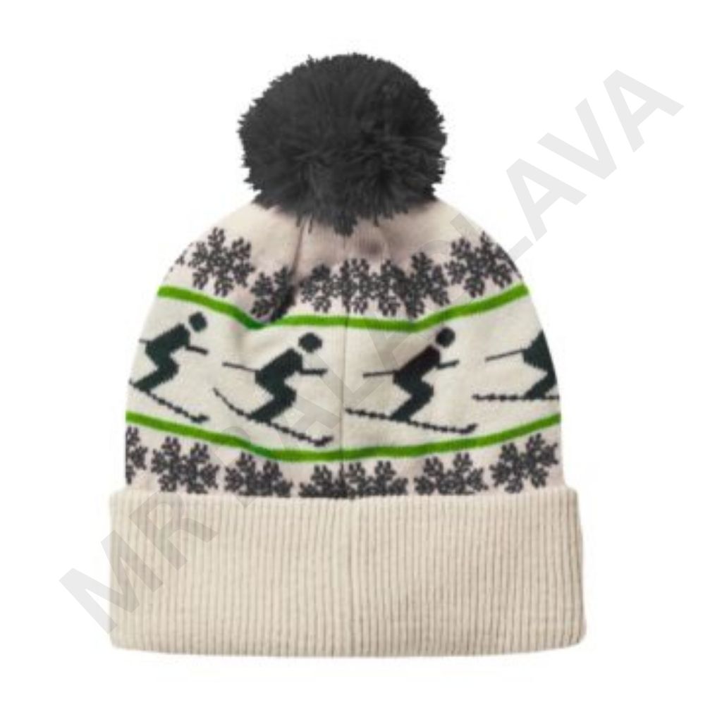 A white knitted winter hat with a black pom-pom, featuring a pattern of black skiers and green lines, and dark gray snowflakes.