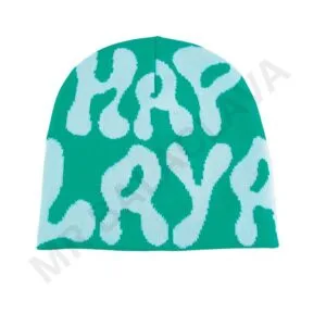 A green beanie with the word "HAPPY" written in a light blue, wavy font.