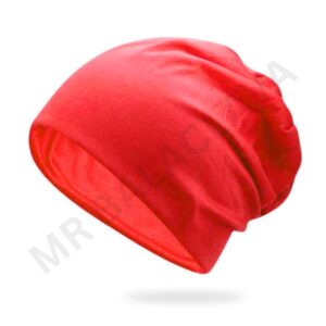 Red slouchy beanie with a soft, gathered fabric.