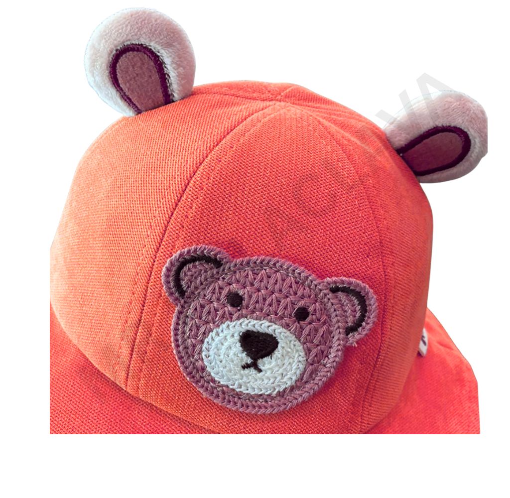 An orange hat with plush bear ears and an embroidered purple teddy bear face.