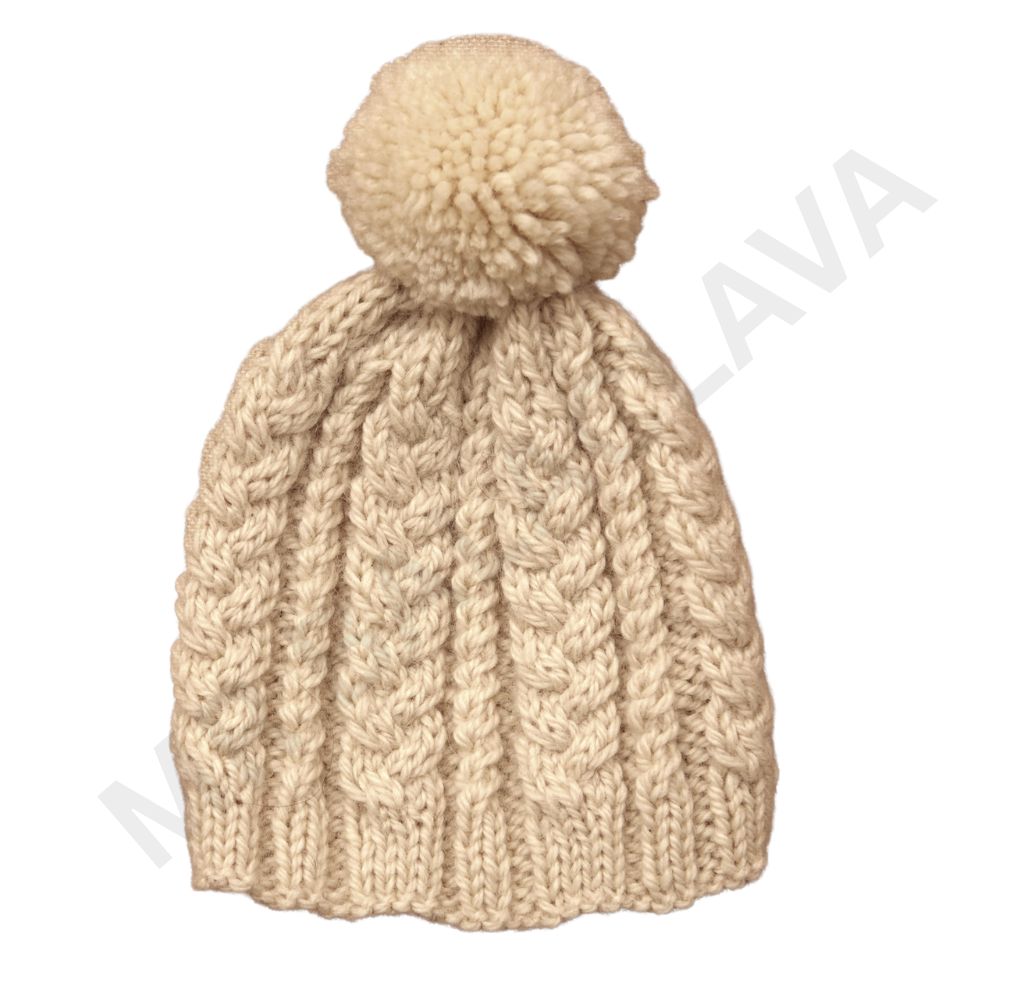 Cream-colored knit hat with a pom-pom and cable knit pattern