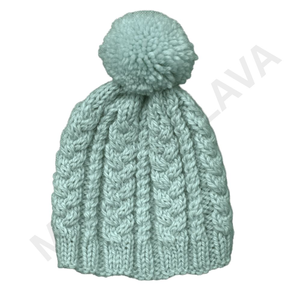Light blue-green knit hat with a pom-pom and cable knit pattern