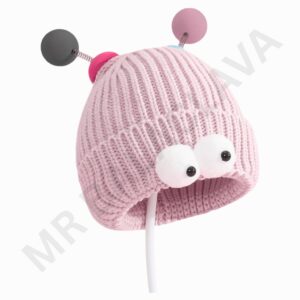 A pink knitted hat with two large white googly eyes sewn on the front and pink antennae with pink balls on top, connected by small springs.