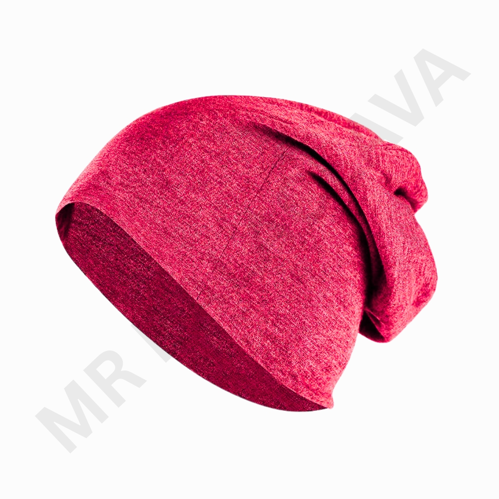 A bright pink knit hat with a slouchy, folded design photographed against a white background.
