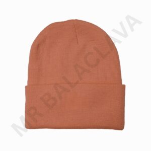 A plain, burnt-orange knit beanie with a wide folded cuff, shown against a white background.