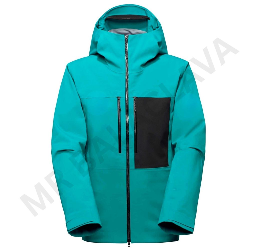 A striking teal technical jacket with black accents and multiple zippered pockets on a white background.