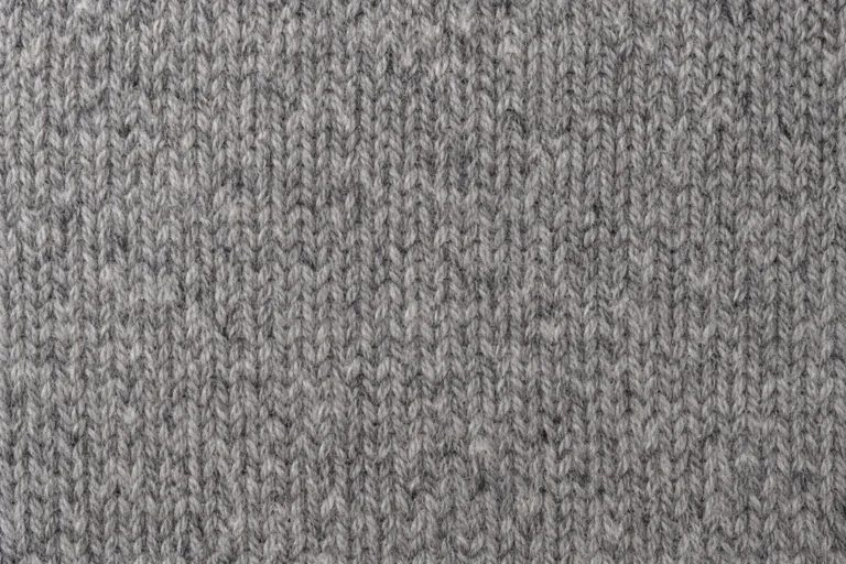 Close-up of heather-grey acrylic and wool blend jersey knit