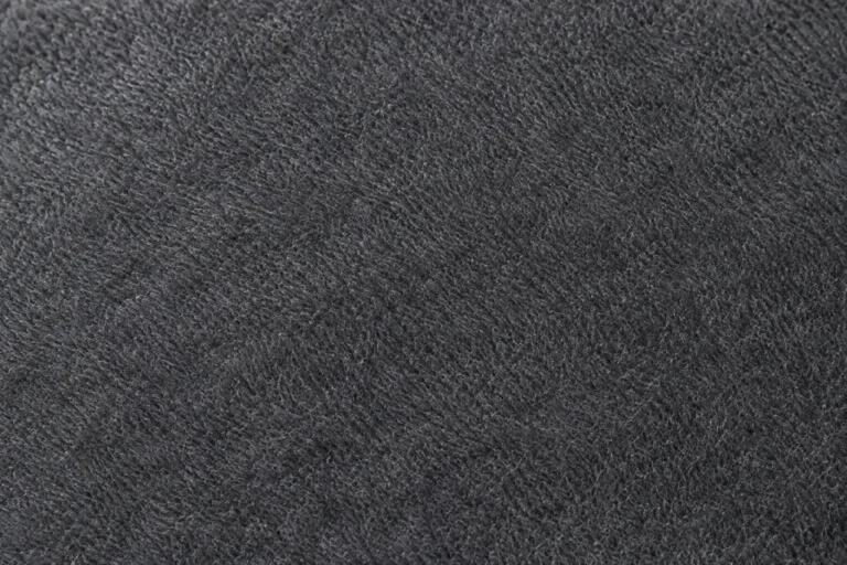 Close-up of charcoal brushed tricot lining with a soft brushed face