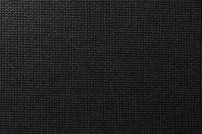 Close-up of black polyester-spandex stretch jersey with a soft sheen