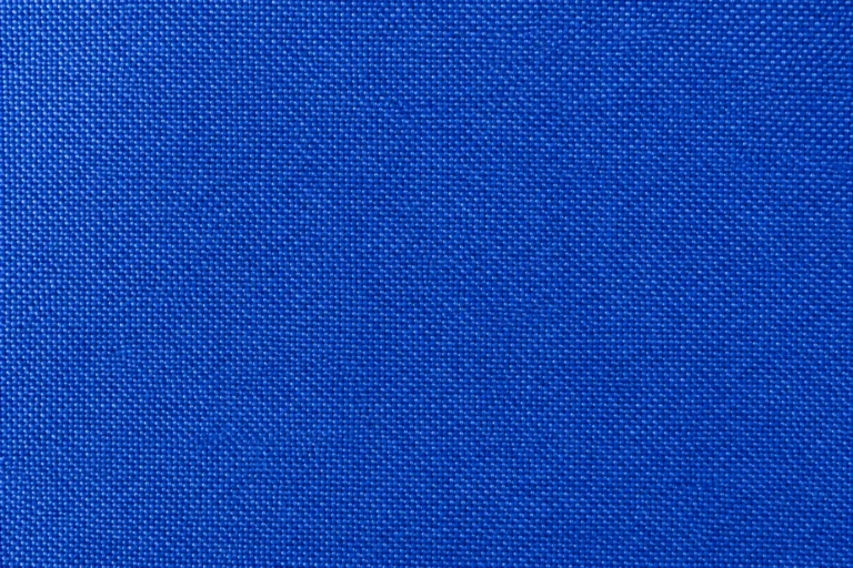 Polyester Pongee Shell: close-up of royal-blue polyester pongee with a fine dense plain weave