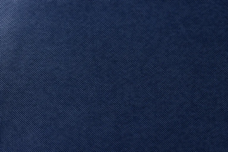 Close-up of navy polyester taffeta lining with a fine plain weave