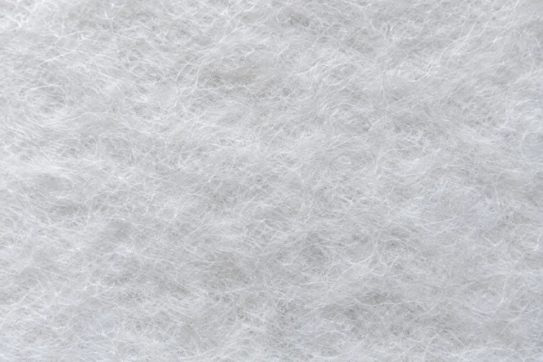 Polyester Wadding (Padding): close-up of white polyester wadding fibres