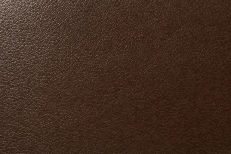 Close-up of dark-brown PU leather-look with a fine grain