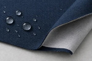 Tissu extérieur laminé 3 couches : échantillon de tissu extérieur 3 couches bleu marine avec de l’eau qui perle et le tricot de support gris