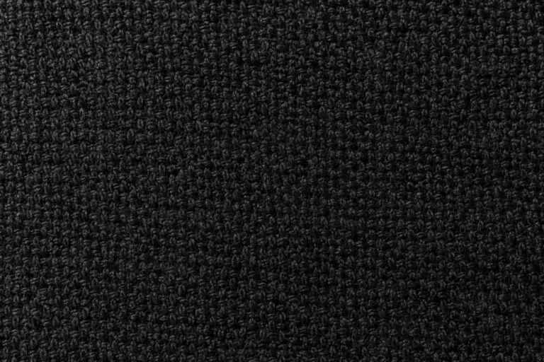 Acrylic/Wool Blend (Snapback Fabric): close-up of black acrylic/wool snapback fabric with a felted face