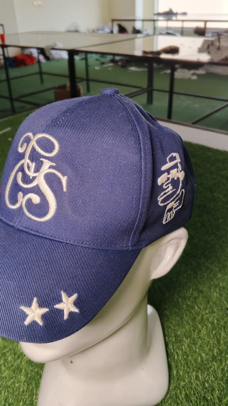 Embroidered monogram baseball cap – On a display head