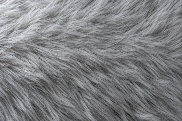 Close-up of silver-grey faux fur with long soft pile