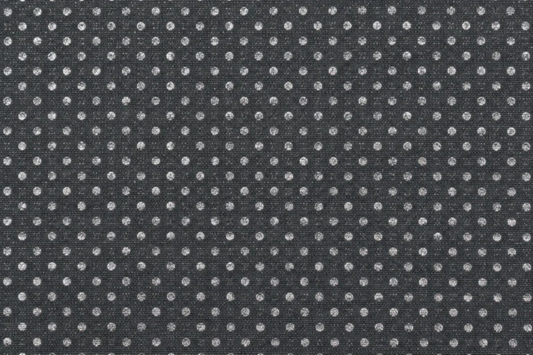 Close-up of heat-reflective lining with a metallic silver dot print