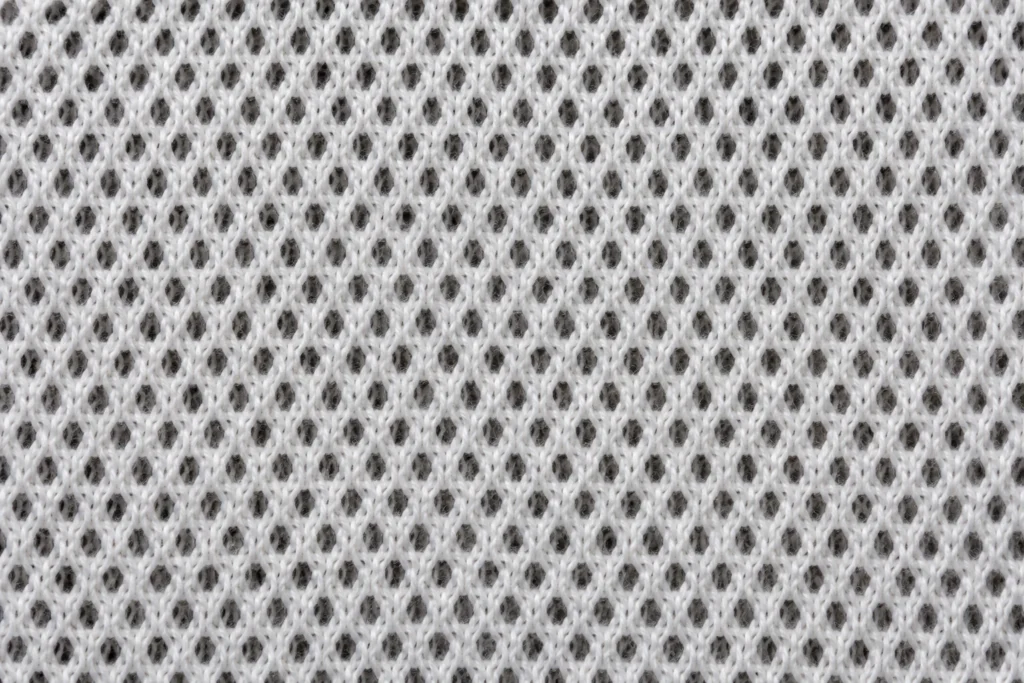 Mesh Vent Sock Panel: close-up of a white mesh vent sock knit