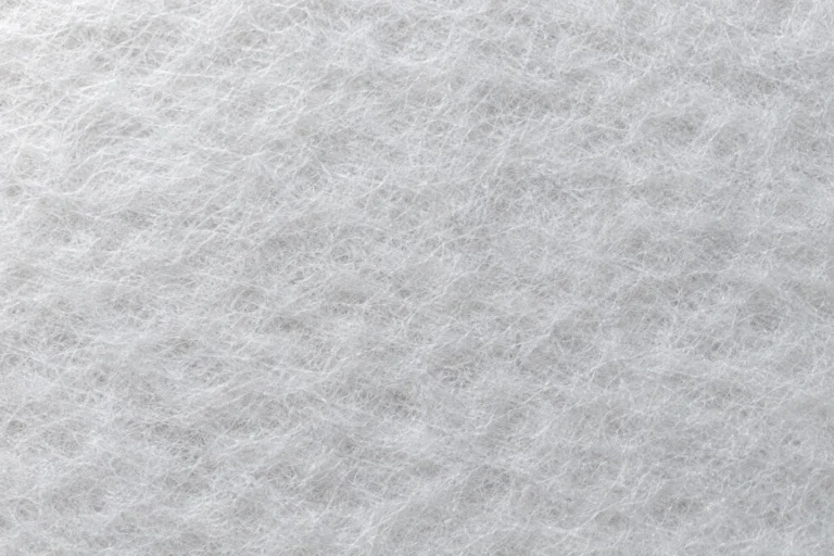 Close-up of white microfibre thermal insulation with very fine fibres