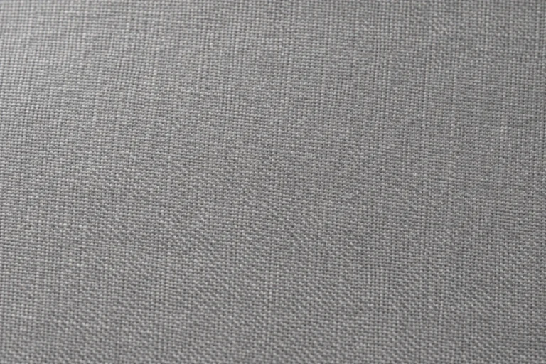 Close-up of soft-grey modal scarf fabric with a fine smooth weave