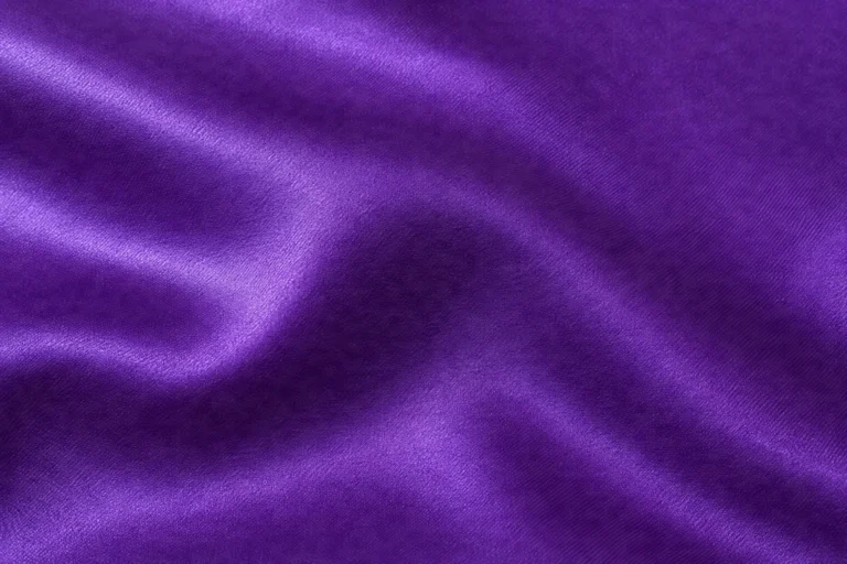 Close-up of glossy royal-purple polyester satin