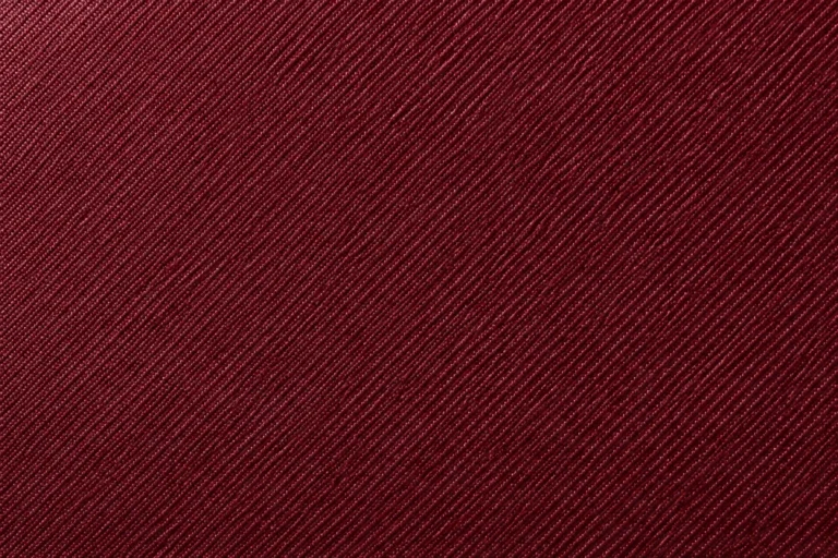 Polyester Twill (Silk-Touch): close-up of burgundy polyester silk-touch twill with fine twill lines