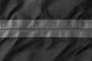 Nahtabdichtungsband (versiegelte Nähte)