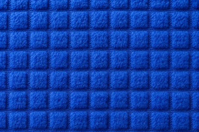 Technical Grid Fleece: close-up of the brushed grid back of royal-blue technical fleece