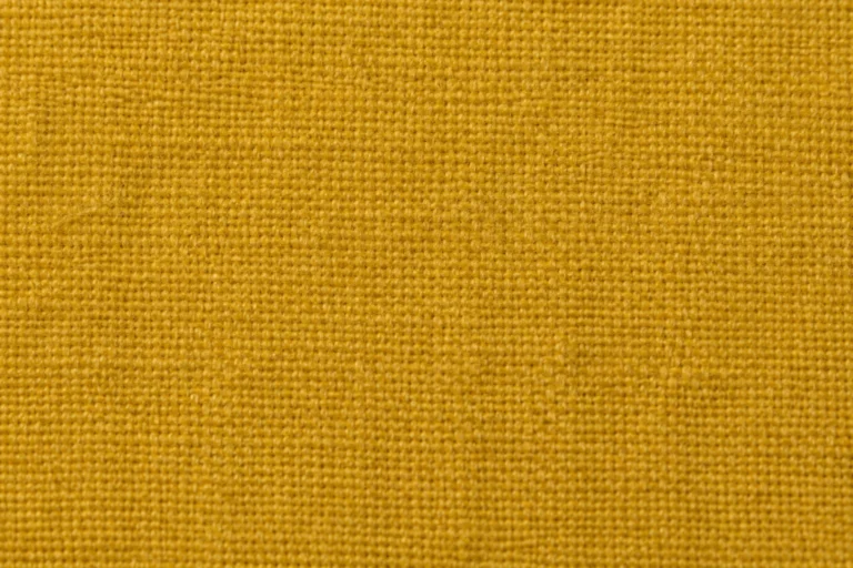 Viscose (Rayon) Challis: close-up of mustard viscose challis with a soft plain weave