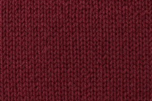 Wool/Acrylic Sock Yarn: close-up of a fine sock knit in burgundy wool and acrylic sock yarn